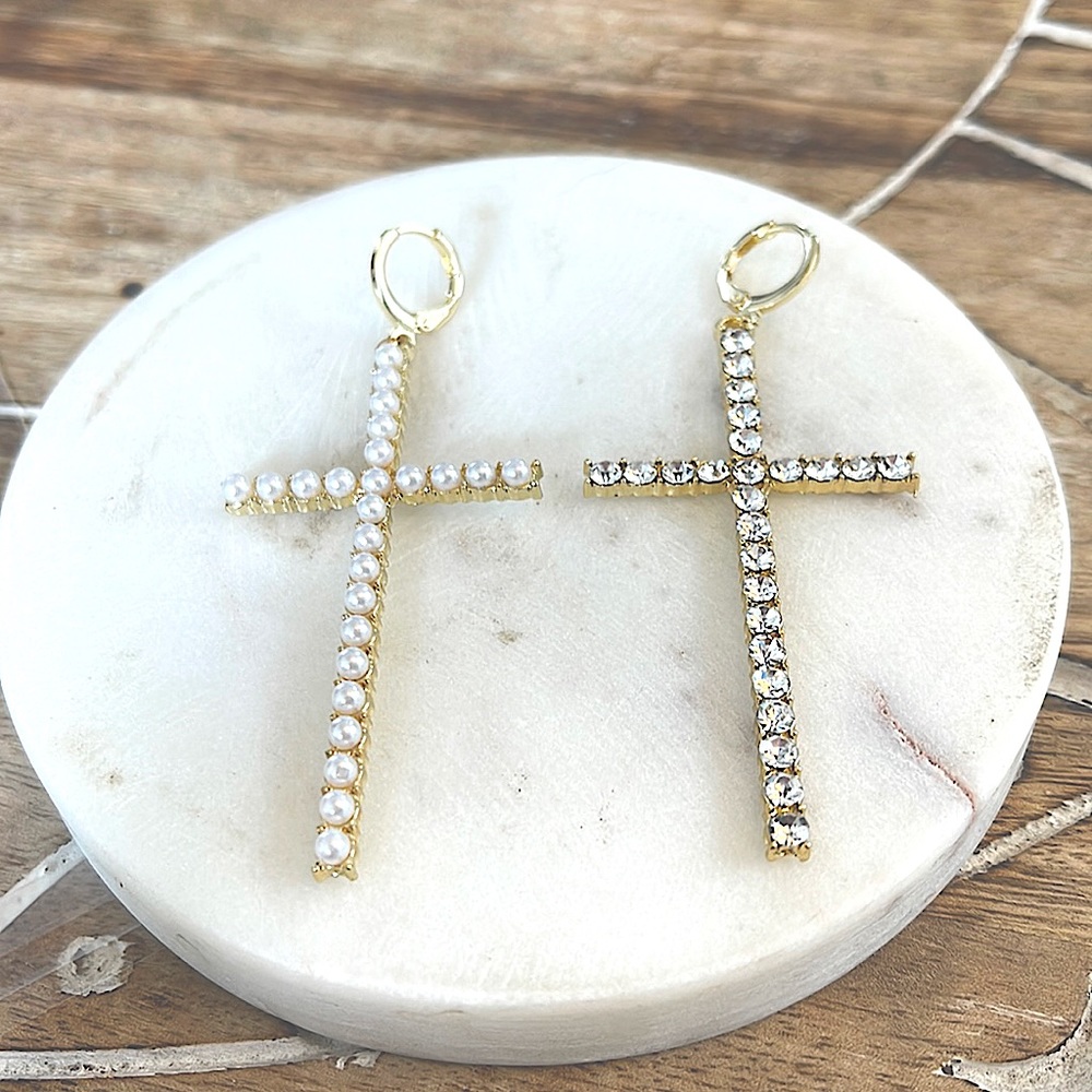 Cross earrings one Pearl and one rhinestone